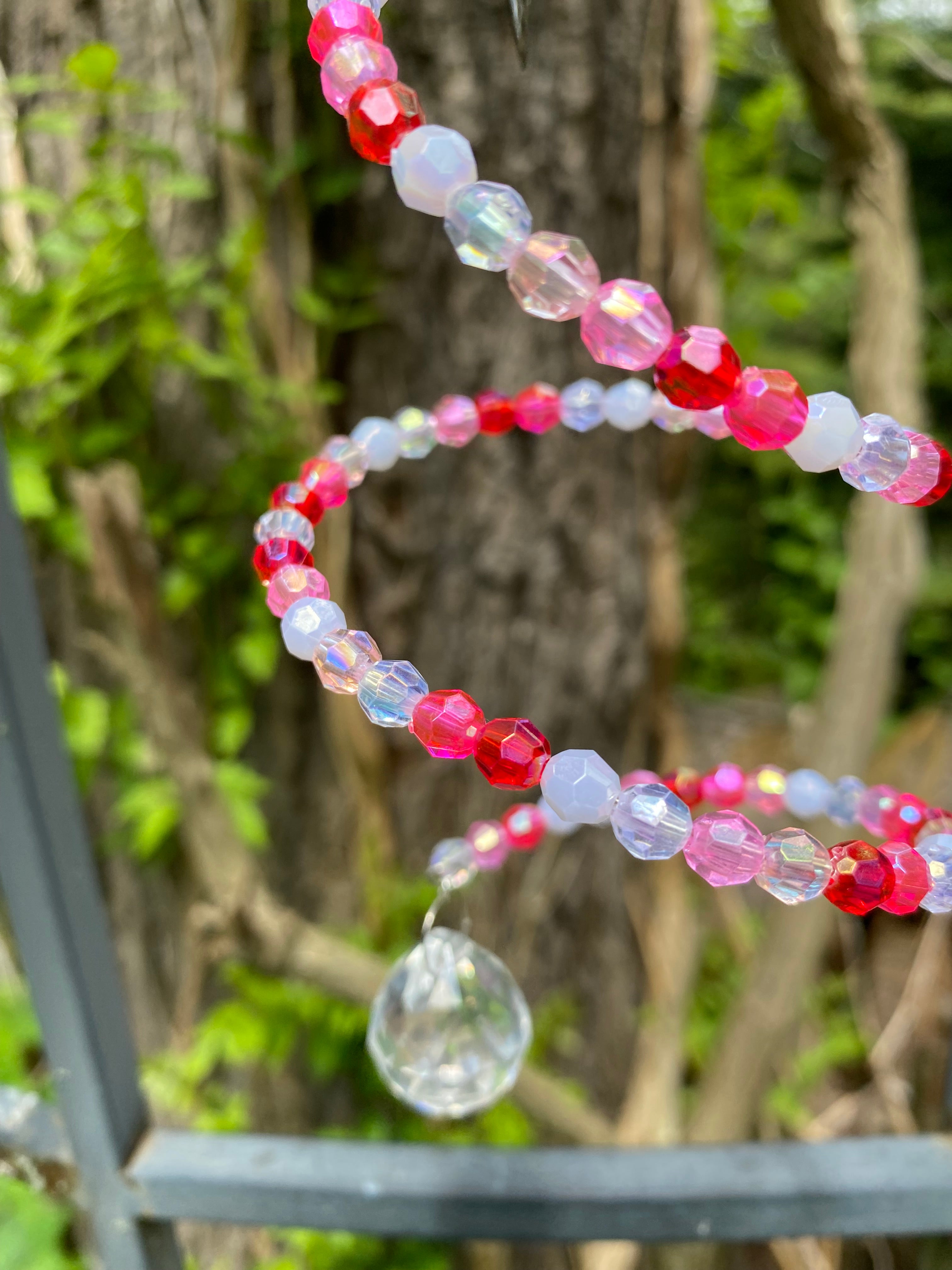 Butterfly rose colored Suncatcher 